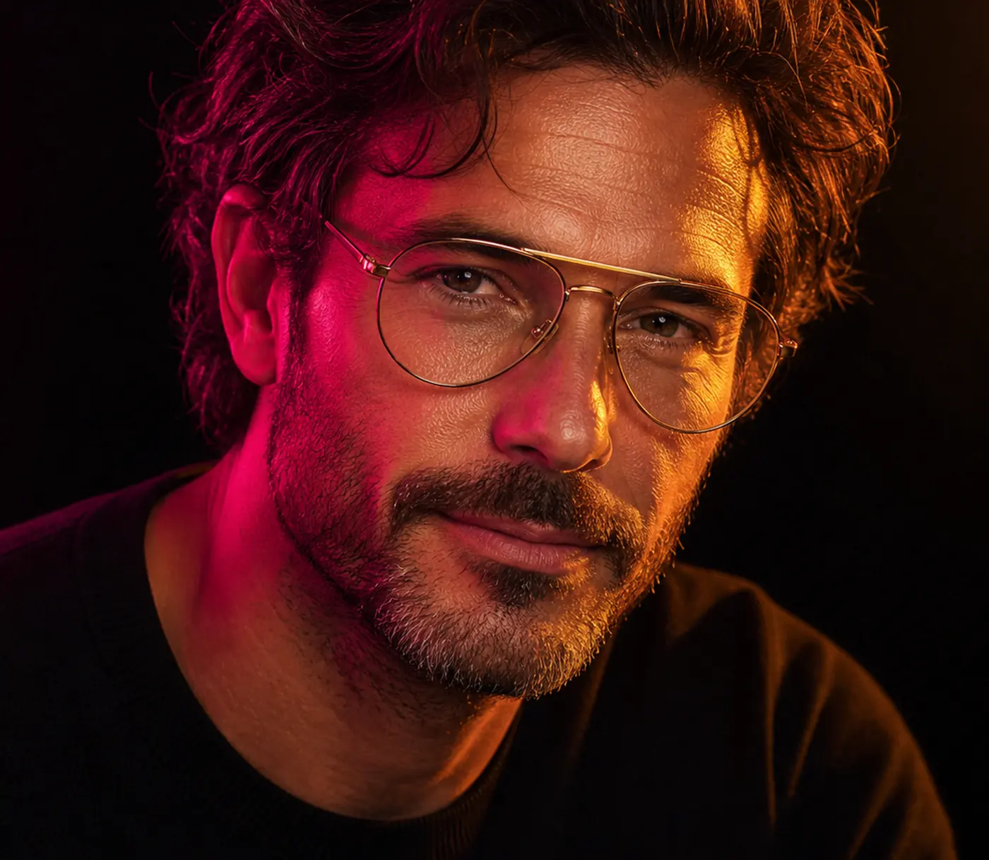 Man in gold aviator eyeglasses